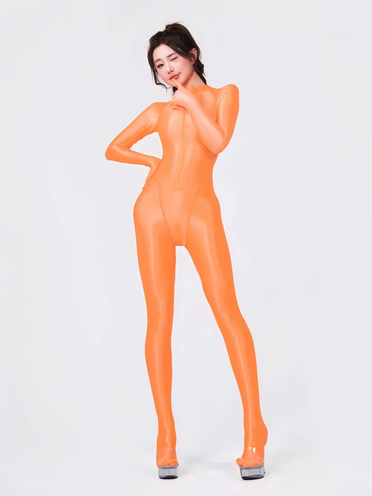 Person wearing an orange full-body suit on a white background
