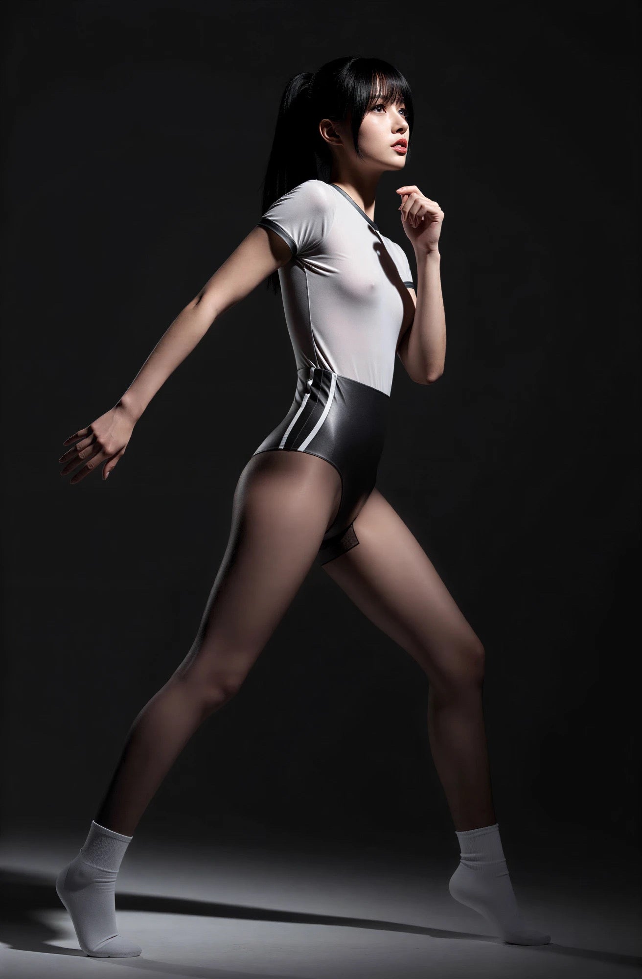 Person wearing a white and black outfit on a dark background