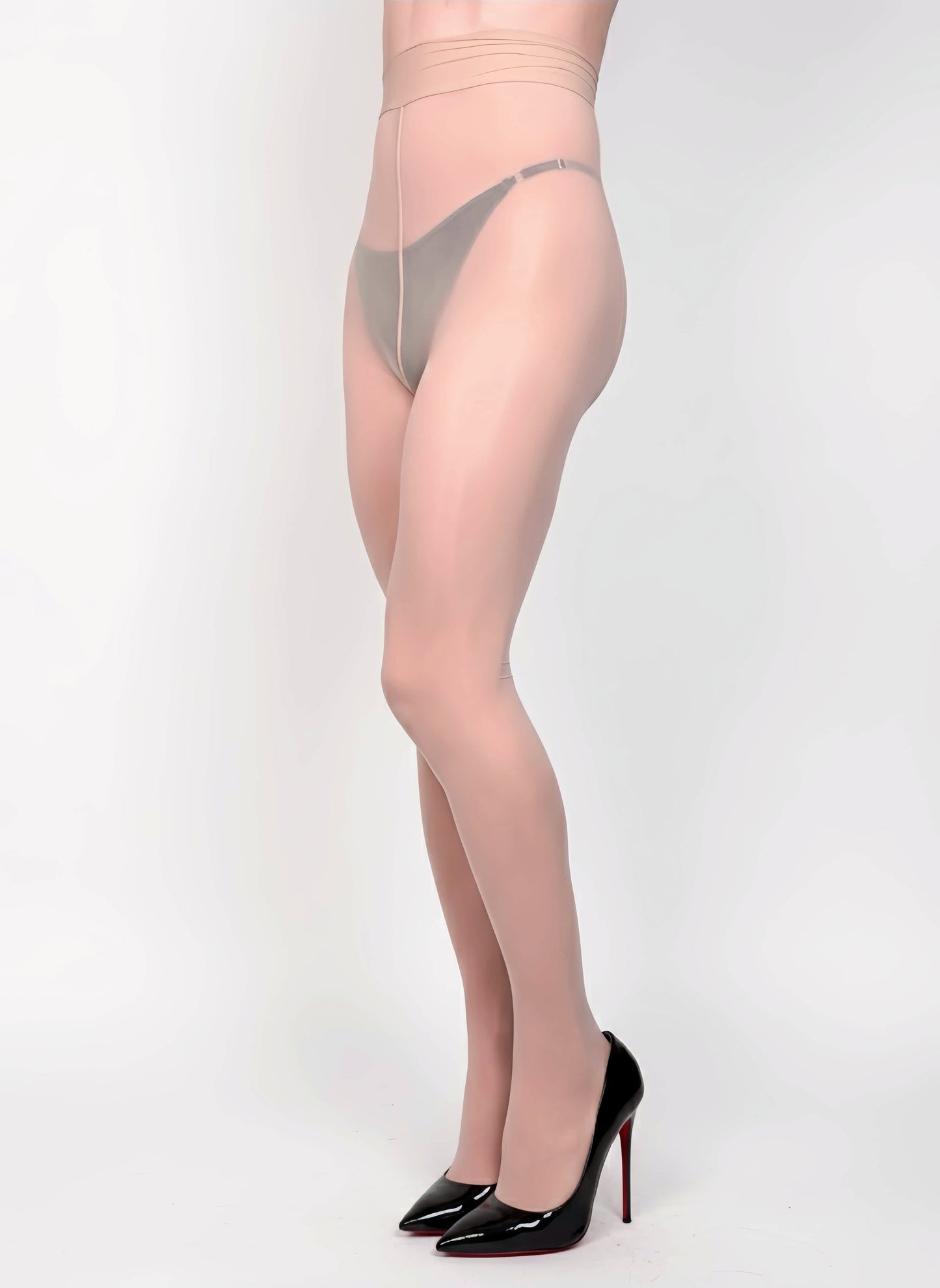 Person wearing sheer stockings with a white background