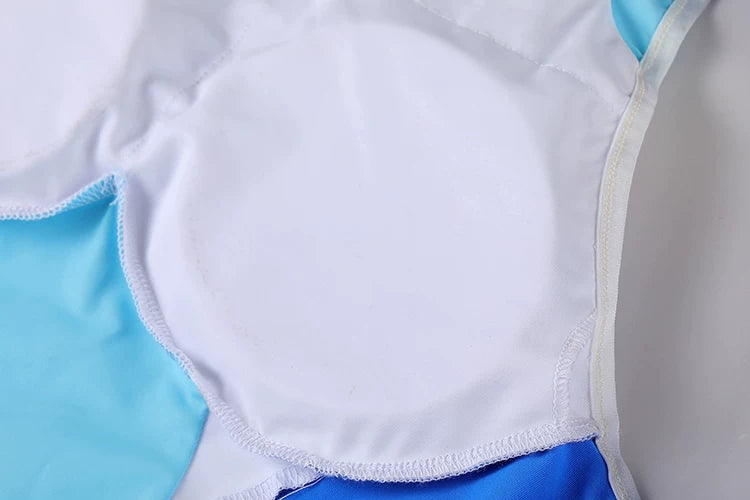 Close-up of a blue and white swimsuit on a light gray background